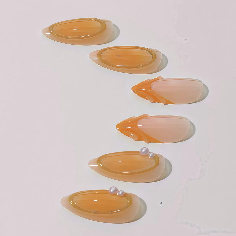 Yabonica short almond nails with gold line design for everyday wear