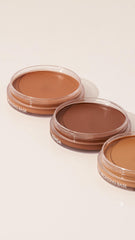 Bronzer on the décolletage for a cohesive sun-kissed warmth across the neck.