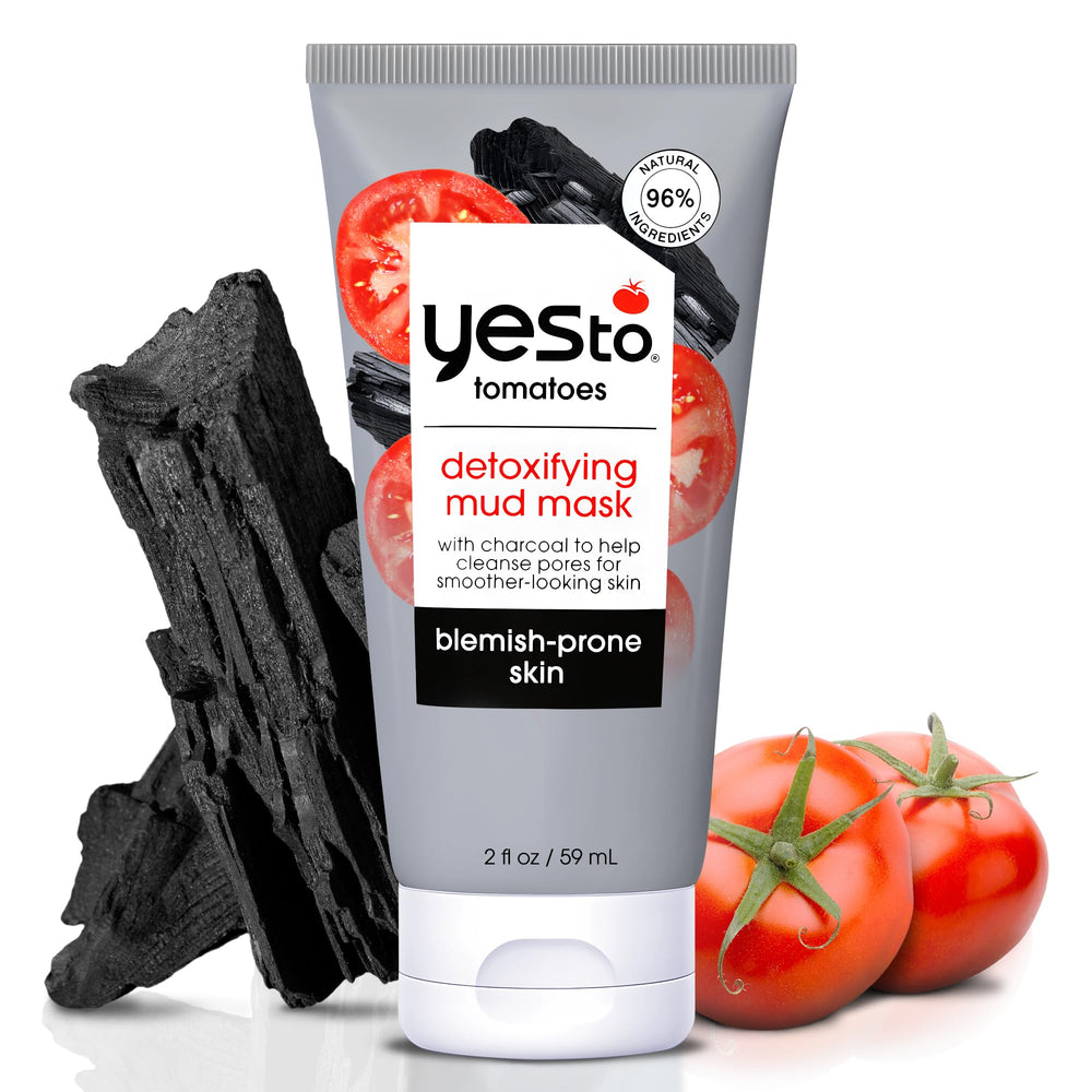 Yes To Tomatoes charcoal mud mask close-up showing pore-drawing cleanse for acne-prone skin
