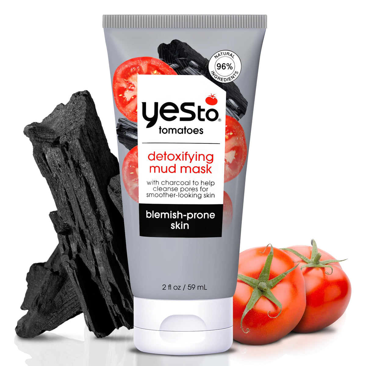Yes To Tomatoes charcoal mud mask close-up showing pore-drawing cleanse for acne-prone skin