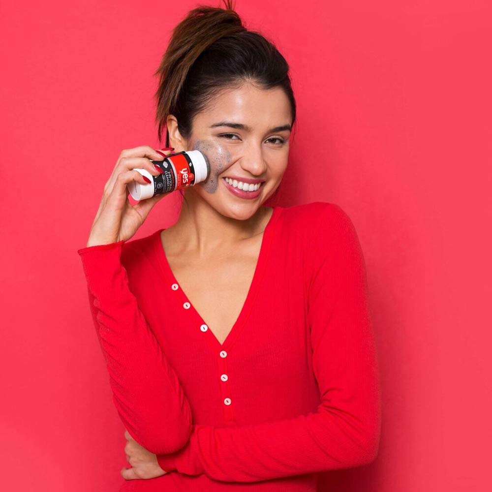 Yes To Tomatoes charcoal stick rinse removes dirt and oil from skin.