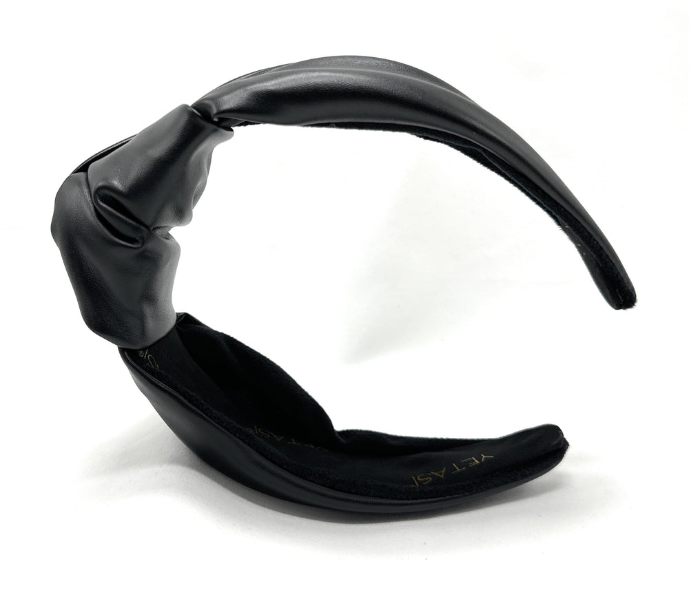 Yetasi top knot headband travels easily in a bag for quick hair fixes.