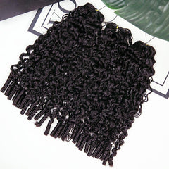 Yimisunny Burmese curly texture close-up with vibrant curls and bounce.