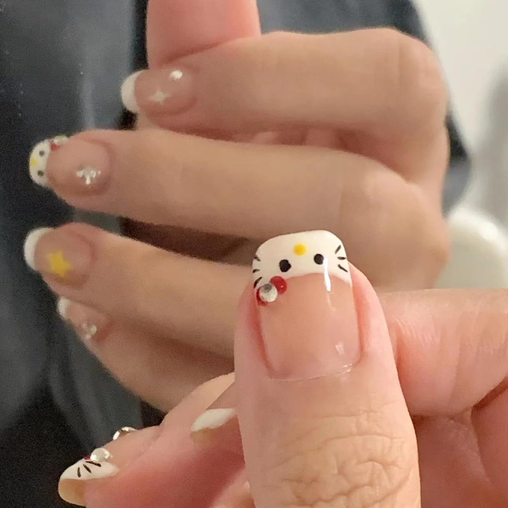 YKZFUI 24pcs French tip nails with rhinestones for easy on-the-go glam