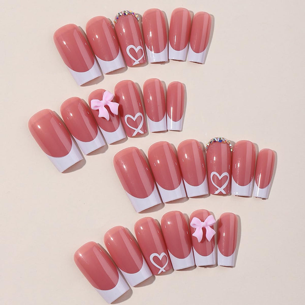 YKZFUI nails with heart rhinestones for elegant party accents