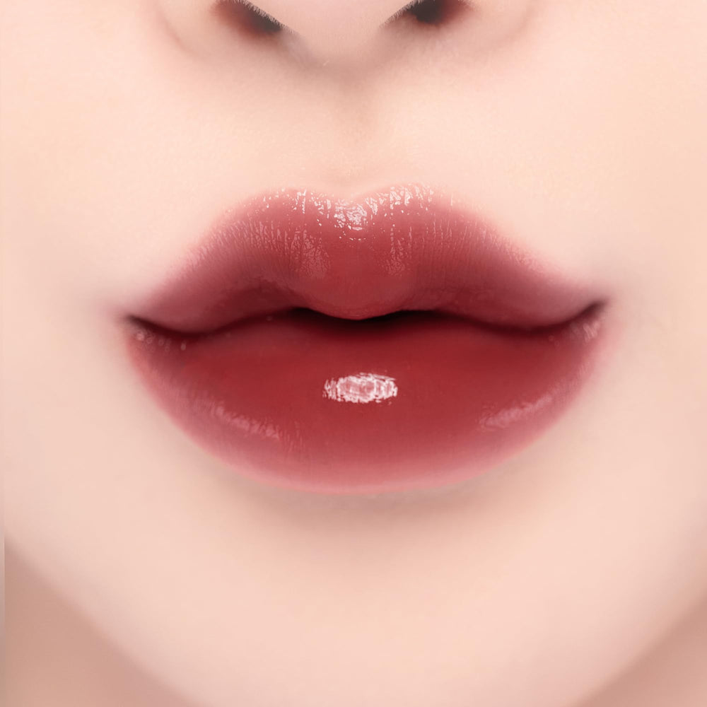 YNM Candy Gloss Balm color swatch on skin demonstrates buildable shade.