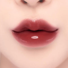 YNM Candy Gloss Balm color swatch on skin demonstrates buildable shade.