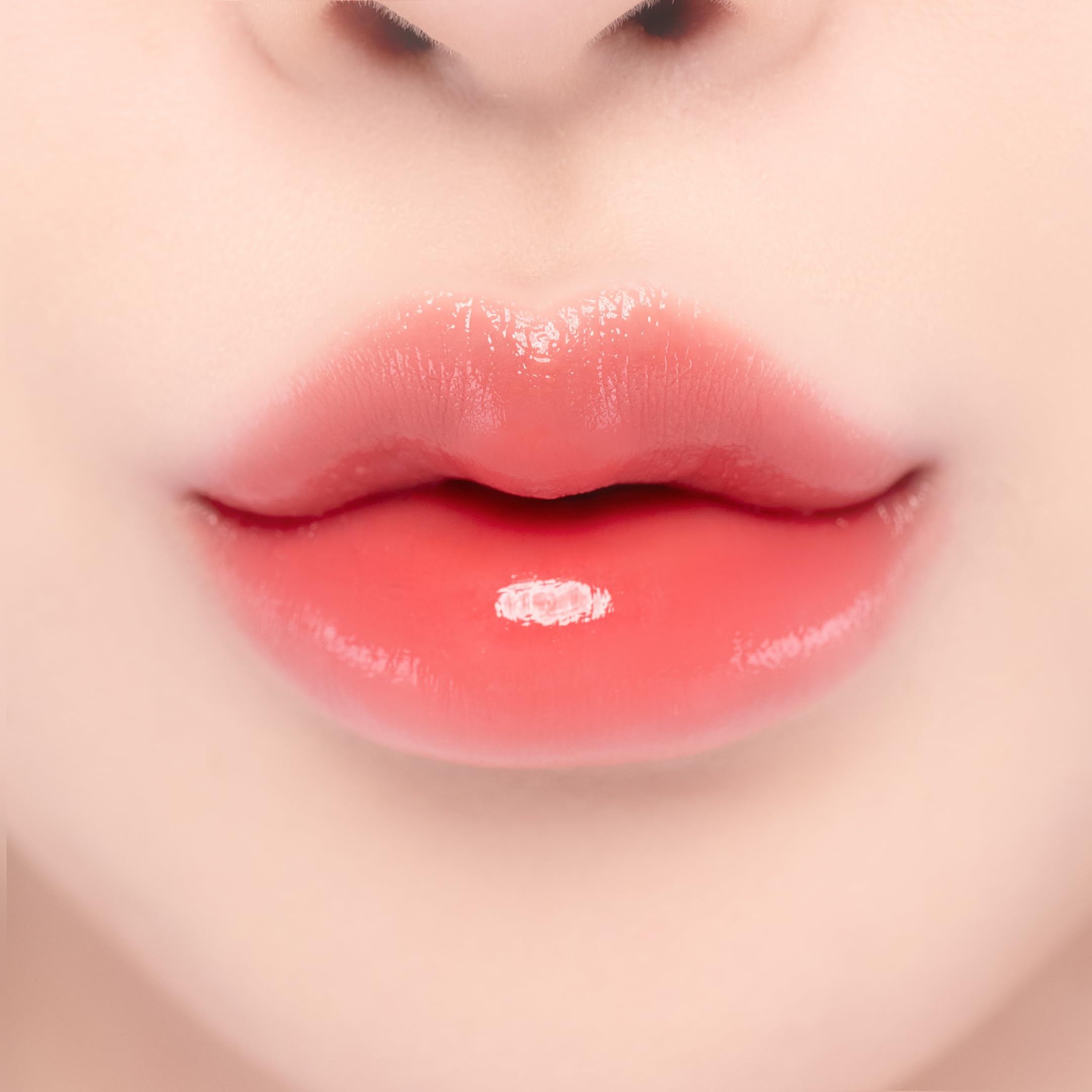 YNM Candy Gloss Balm Coral Moment color swatch for vivid lips