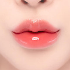YNM Candy Gloss Balm Coral Moment color swatch for vivid lips