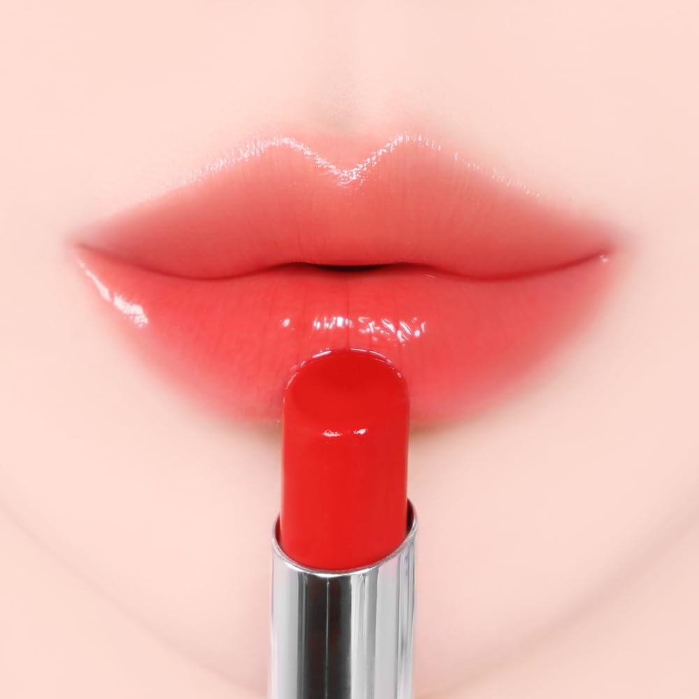 YNM Candy Gloss Balm glossy texture enhances smooth lips with soft color.