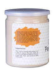 Close-up of Yogi’s Gift orange peel powder jar for brightening and exfoliation.