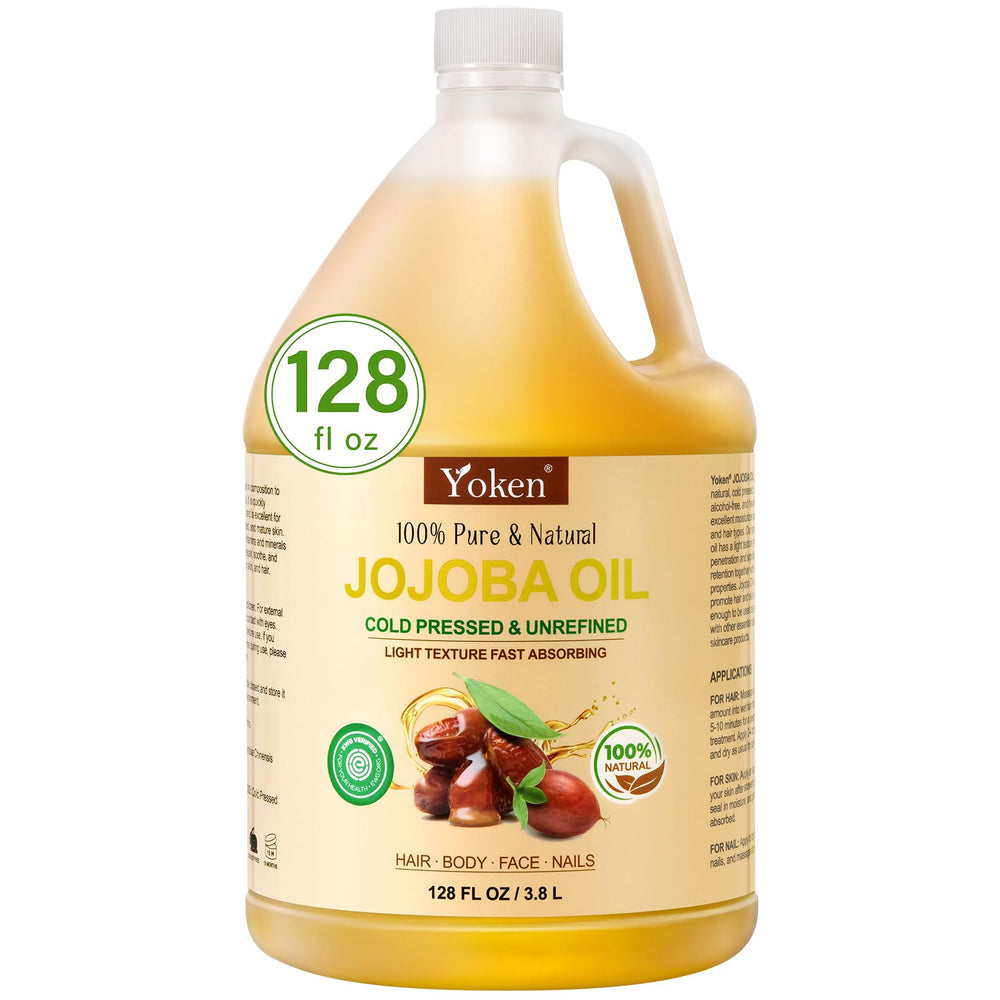 Yoken Jojoba Oil 1 gallon bottle poured for hair and skin care.