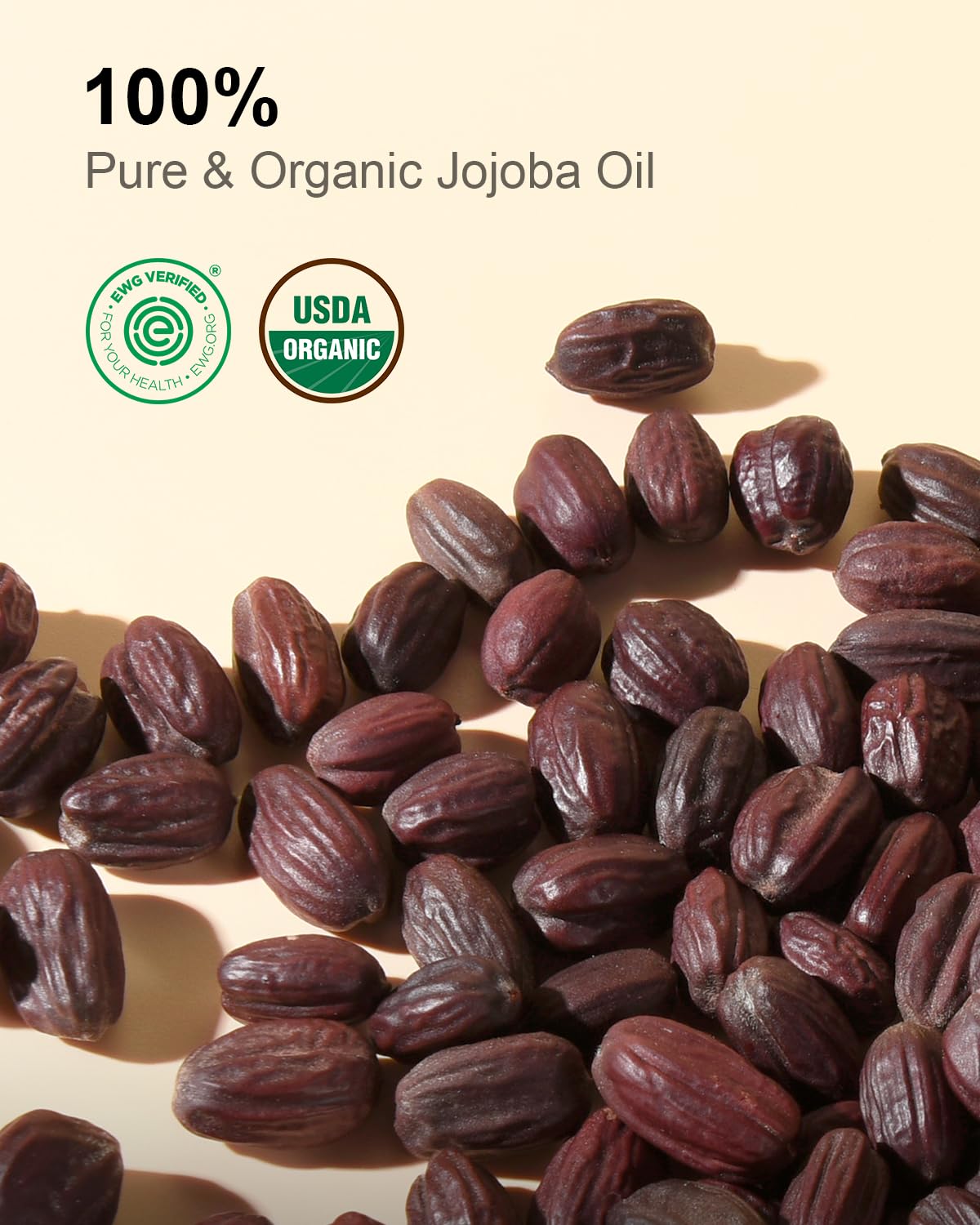 Yoken jojoba oil amber bottle cap close-up emphasizing light protection.