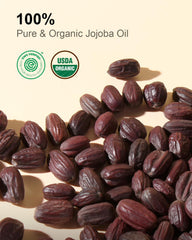Yoken jojoba oil amber bottle cap close-up emphasizing light protection.