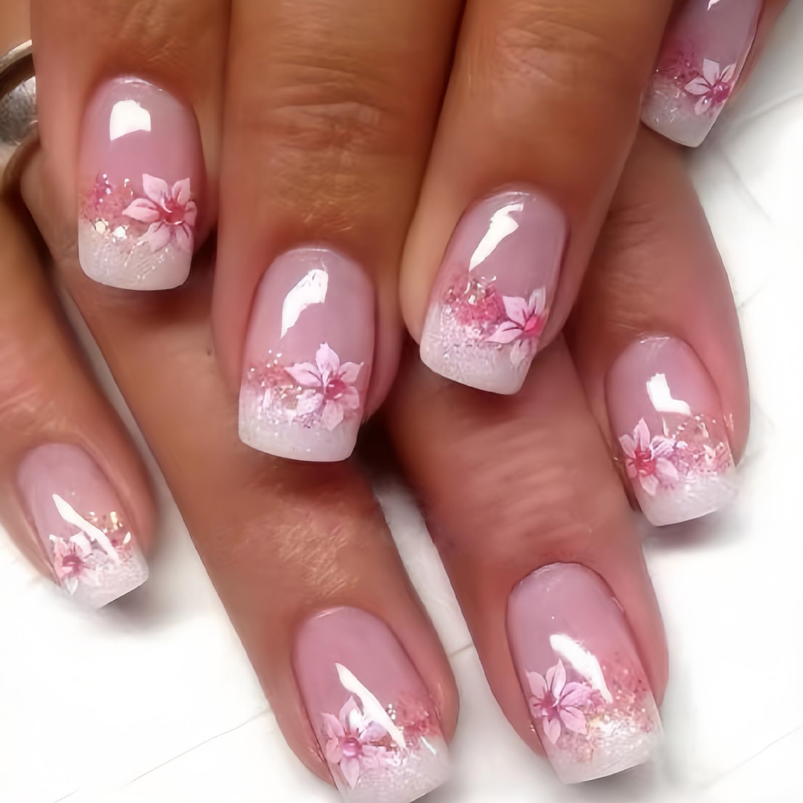 YOSOMMK press-on nails with flower designs in nude pink for quick manicure.