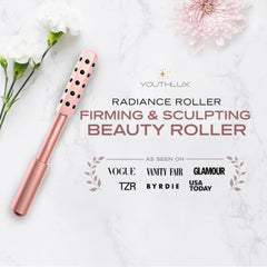 YOUTHLUX Radiance Roller rose-gold finish for de-puffing and contouring.