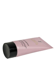 YSL MON PARIS travel-size lotion, portable hydration on trips.