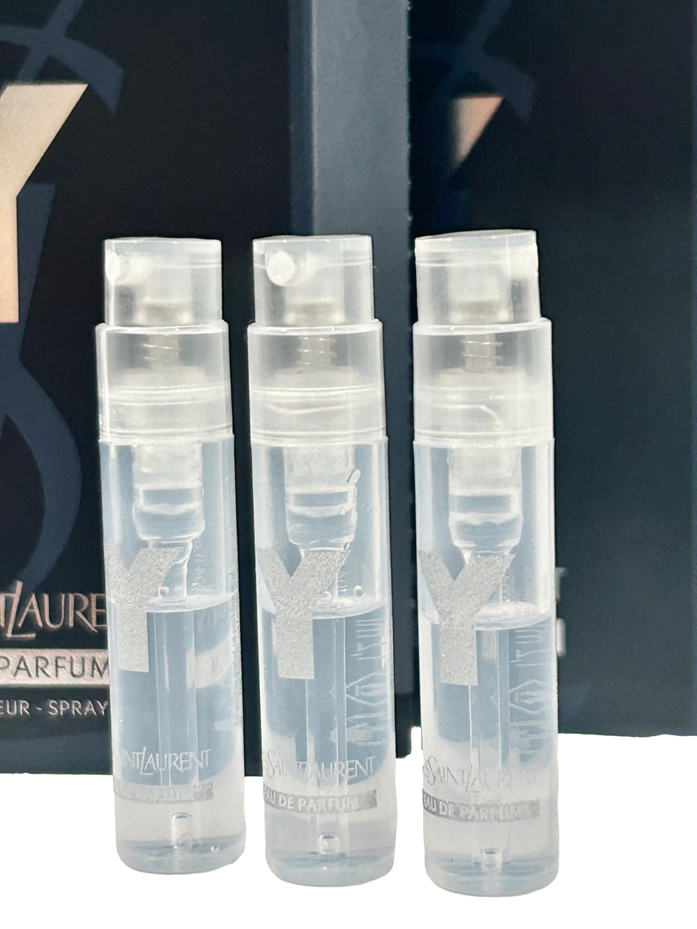 YSL Y Men EDP vial—small spray for quick refreshes at work or events.