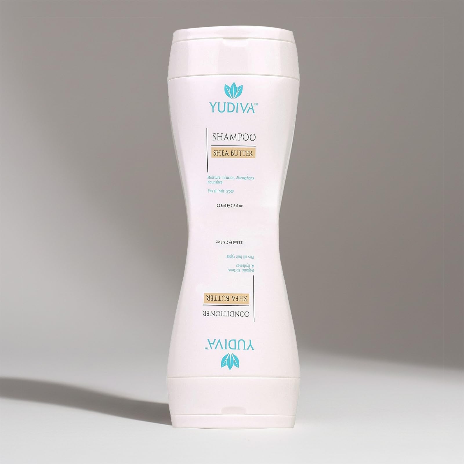Close-up of flip-top caps on the YUDIVA two-chamber bottle for mess-free dispensing.