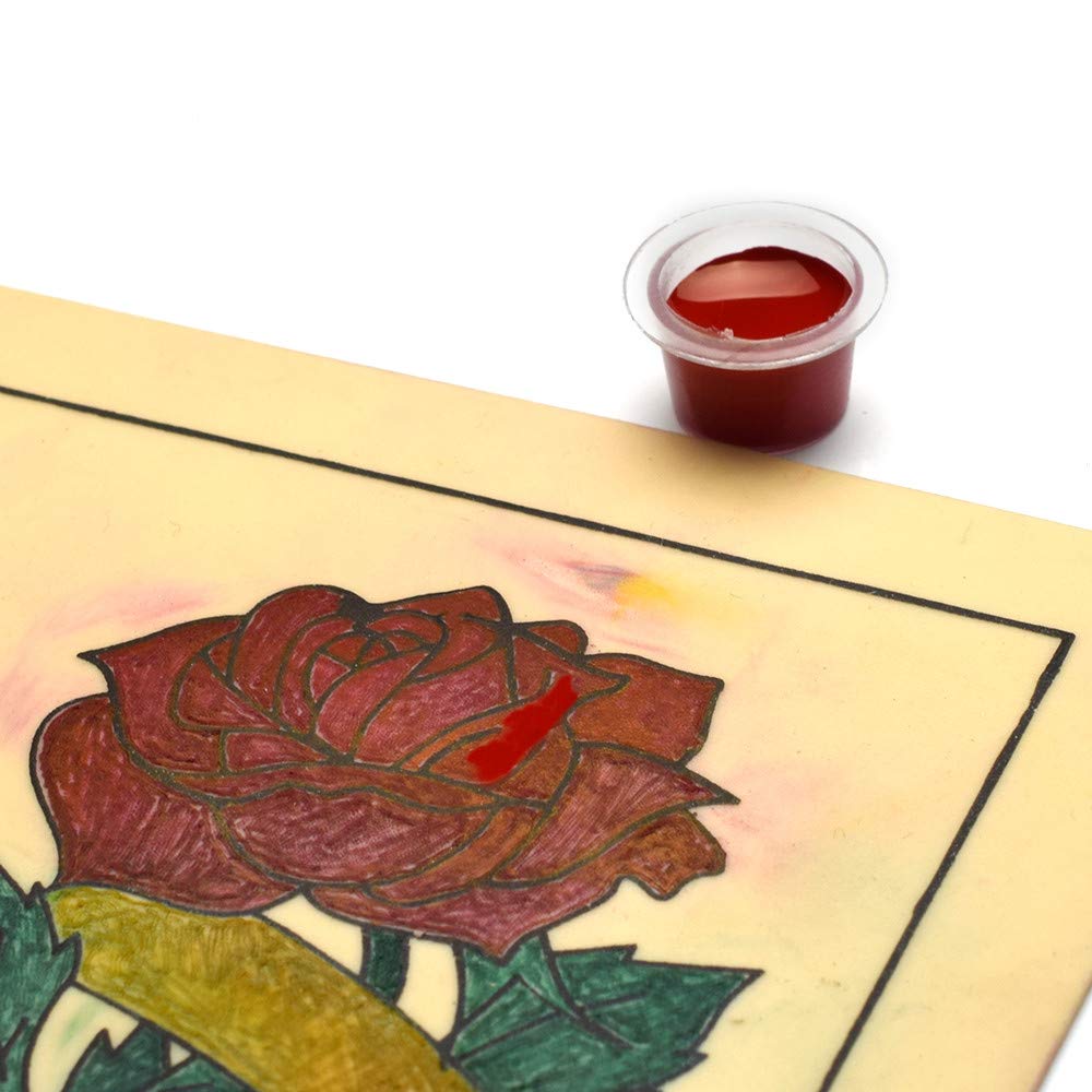Yuelong tattoo cups hold ink and eyebrow pigments with ease.
