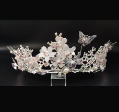 Yunyuebridal rhinestone crown on model, ideal for weddings and photos.