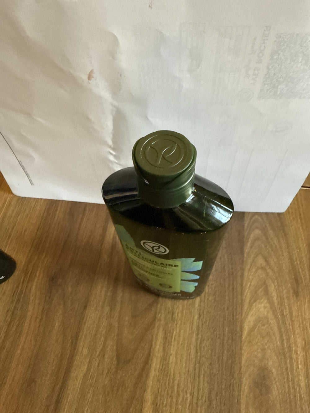Shower shelf with Yves Rocher bottle in bathroom, easy daily use