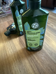 Close-up of Yves Rocher bottle label highlighting natural ingredients