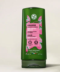 Close-up of Yves Rocher conditioner label highlighting gentle cleansing for dyed hair.