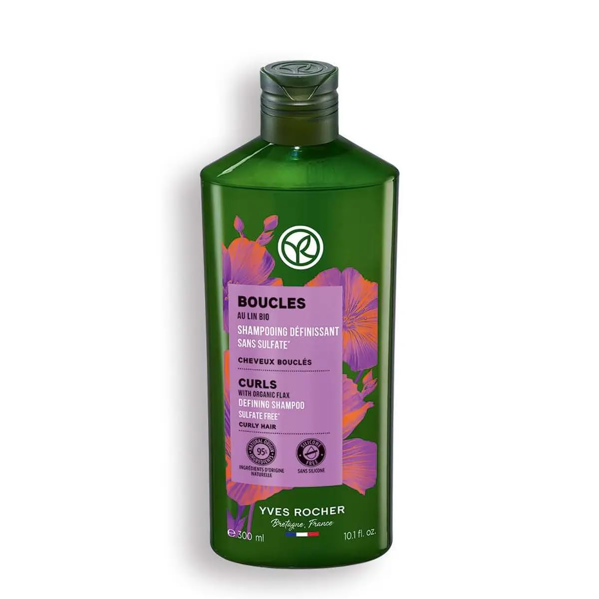 Yves Rocher Curls Shampoo bottle pouring, showcasing organic flax extract for nourished curls.