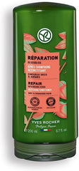 Applying conditioner on wet hair for even distribution and nourishment.