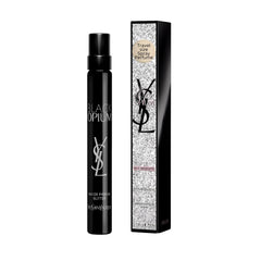 YSL Black Opium Glitter bottle on vanity showcasing bold design