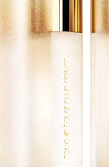 Yves Saint Laurent Blur Primer argent, éclat subtil qui ravive le teint sans excès.
