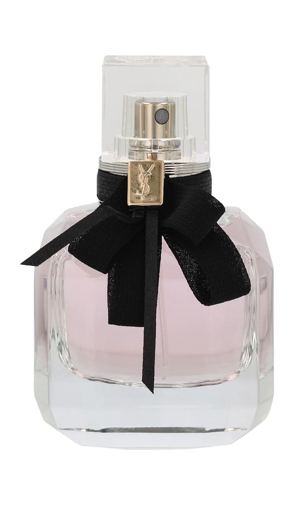 Mon Paris spray bottle shown for quick, stylish fragrance touchups.