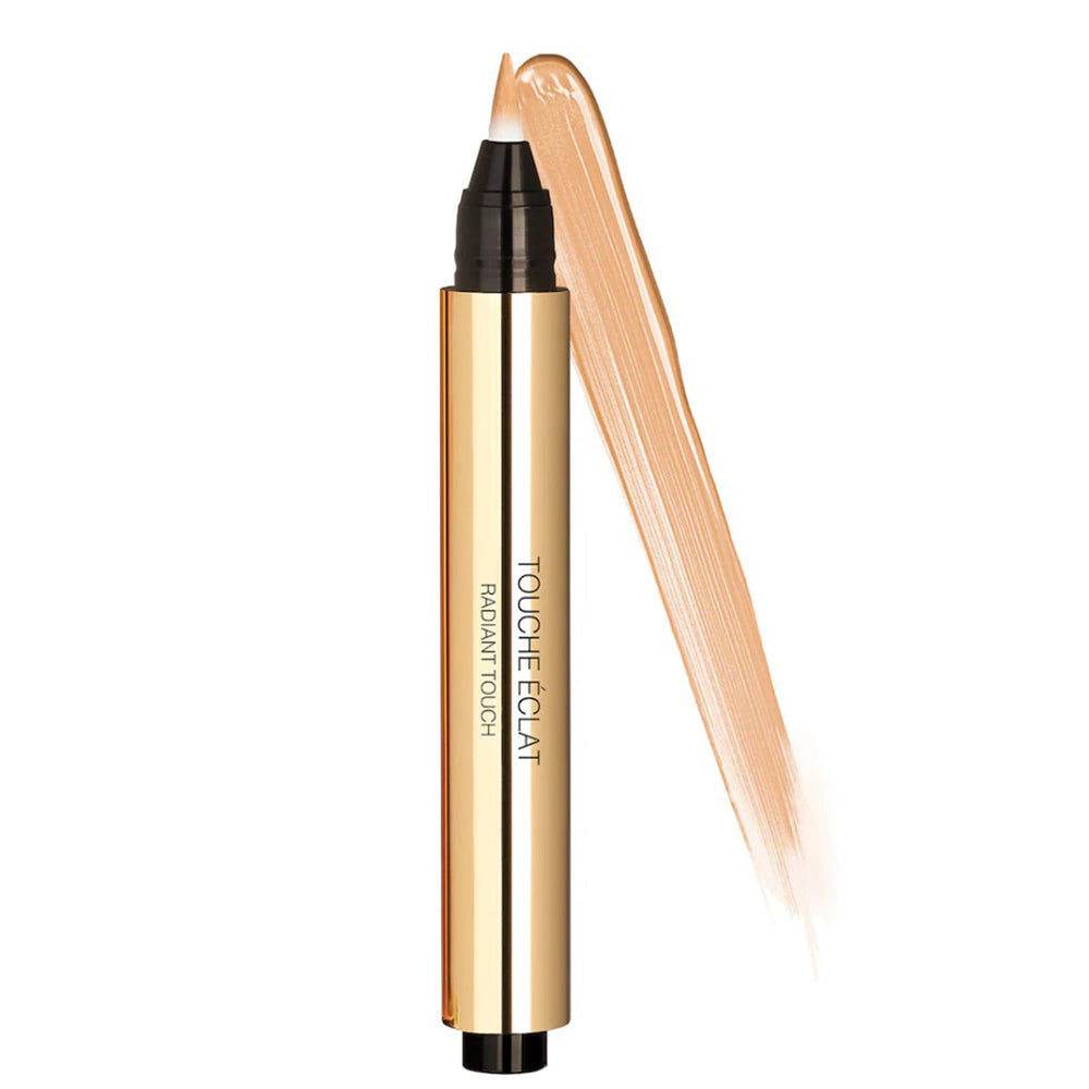 YSL Touche Eclat 3 Light Peach brush tip visible, precise application