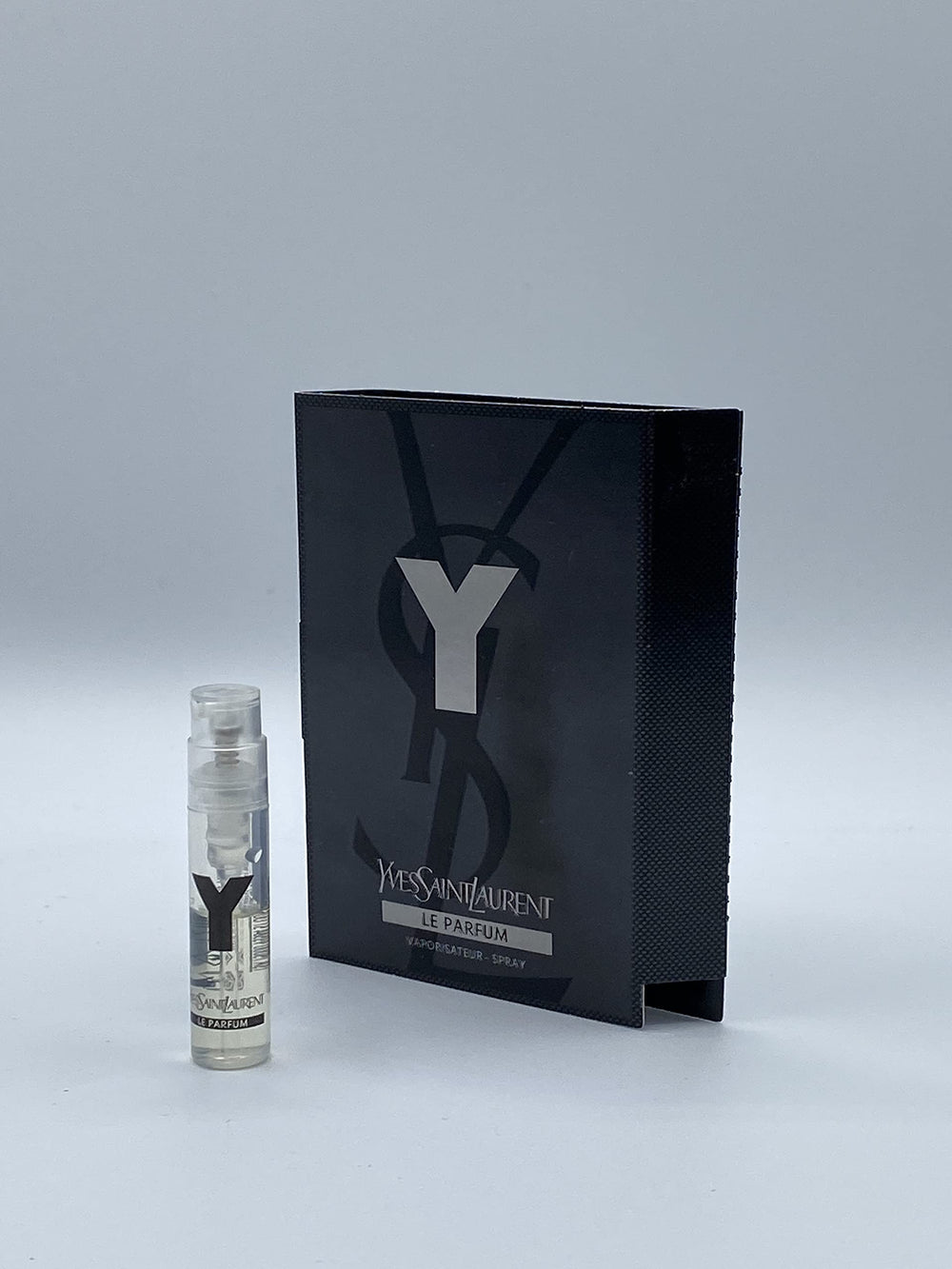 YSL Y For Men sample bottle, front view, half-filled for trial fragrance.