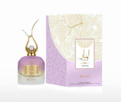 Zakat Fortune Eau de Parfume bottle-pour highlighting uplifting floral-citrus notes for daily elegance