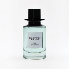 Zara Olfactive 01 Energetically New York EDP outer pack shot emphasizing warm sandalwood base for evenings.