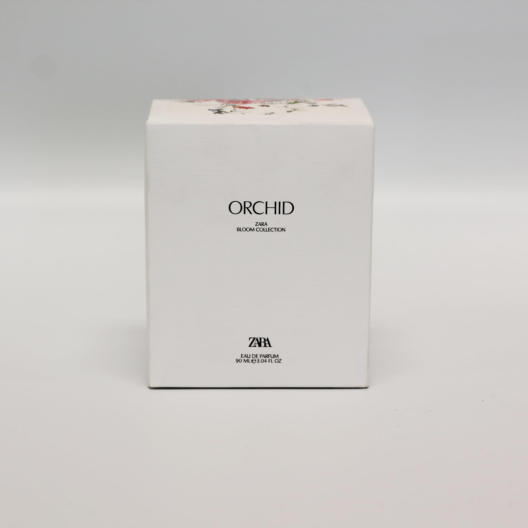Zara Orchid perfume application demonstrates a smooth spray for all-day freshness.