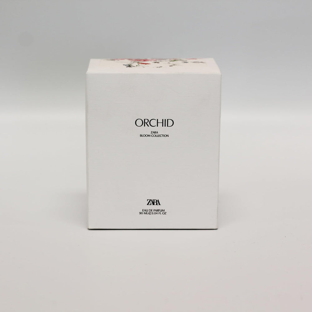Zara Orchid perfume application demonstrates a smooth spray for all-day freshness.