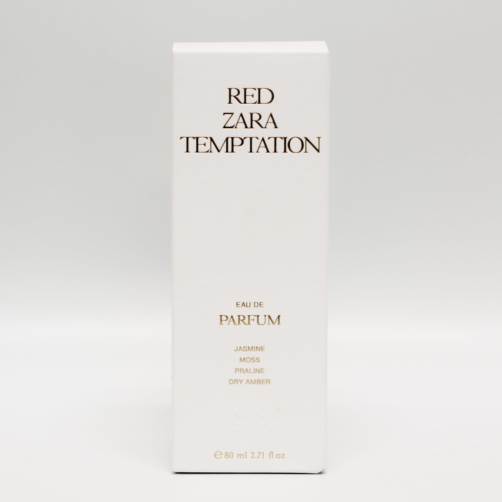 Zara Red Temptation bottle reveals mossy woody amber base for depth.