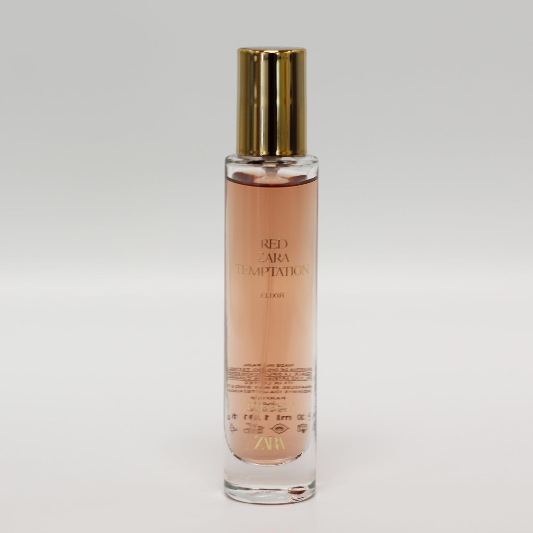 Zara Red Temptation Elixir Parfum opening with spicy notes, inviting confidence for daywear.