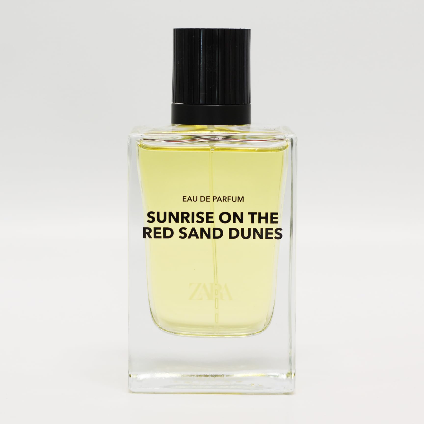 Zara Sunrise desert backdrop emphasizes energetic citrus opening