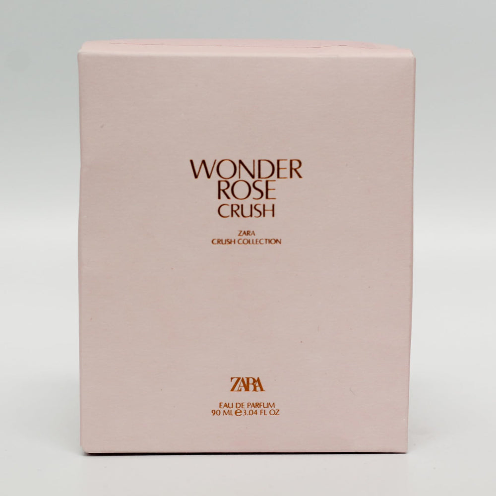 Signature glass bottle highlights the modern rose heart and elegant style.