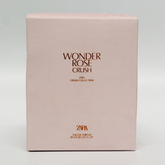 Signature glass bottle highlights the modern rose heart and elegant style.