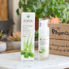 Packaging front of Zatik Gratitude Serum emphasizing organic, vegan formula.