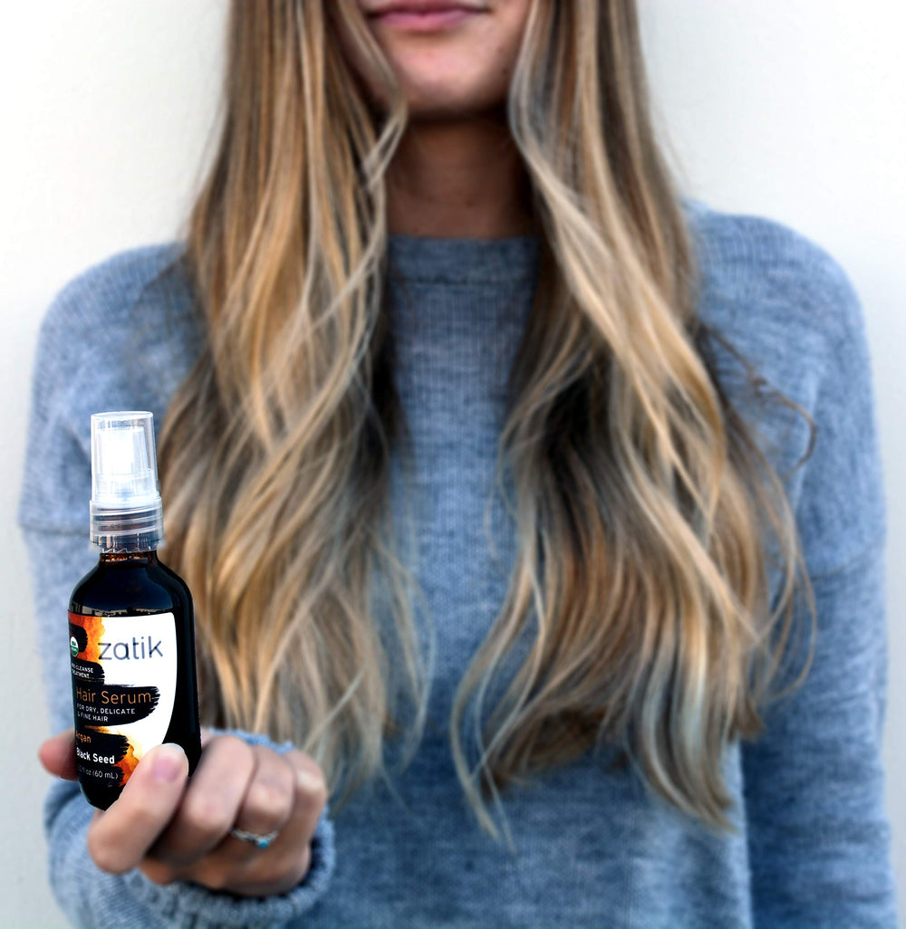 Zatik Hair Serum vegan and non-GMO formula label on bottle