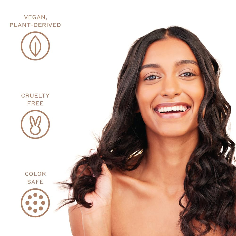 Zenagen Densifying Hair Serum on scalp during application suggests root nourishment.