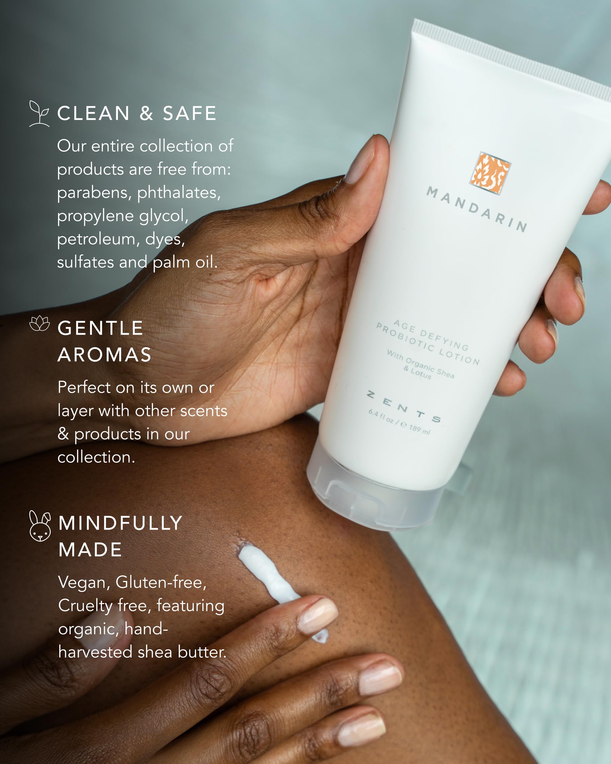 Zents Age-Defying Lotion on the vanity with a palm-sized jar.