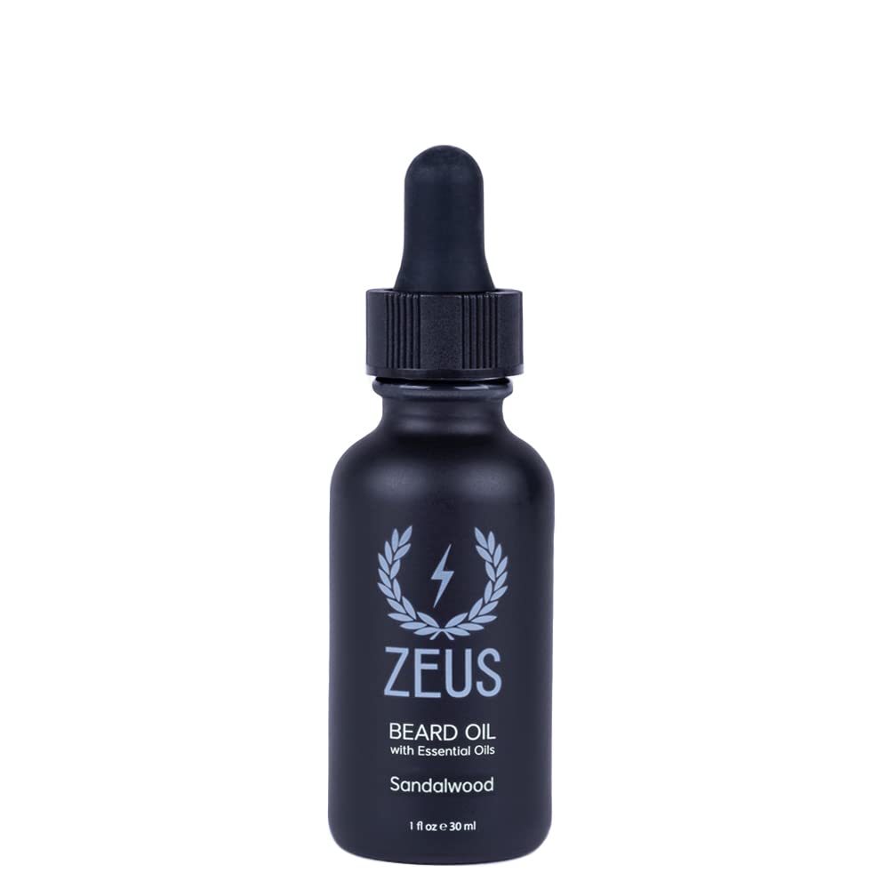 ZEUS Natural Beard Oil bottle pour delivering instant hydration and frizz control.