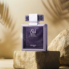 Zimaya Abadi Opulent close-up of geranium and juniper depth.